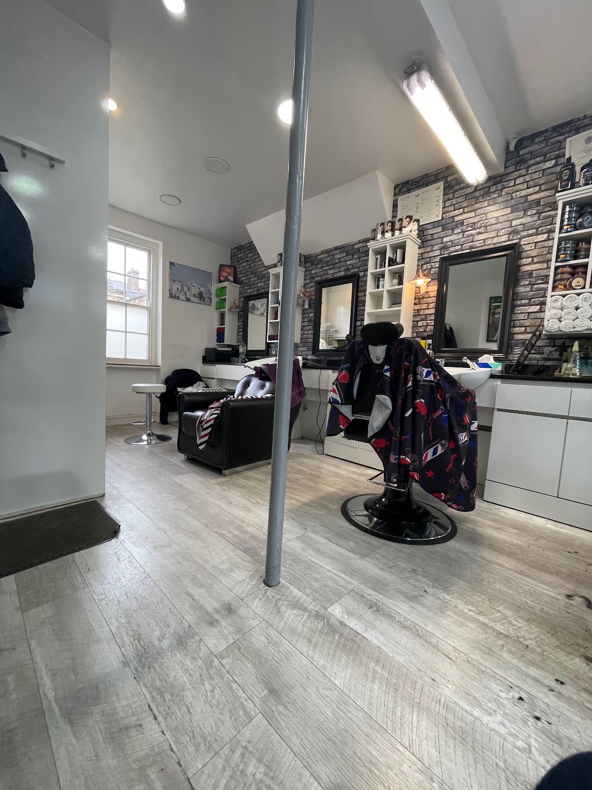 Looking down the length of the shop towards the rear window